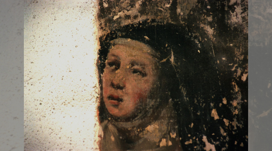 Détail de peinture murale du 17ième: une soeur clarisse en prière