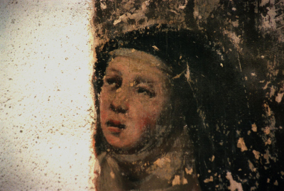 Détail de peinture murale du 17ième: une soeur clarisse en prière